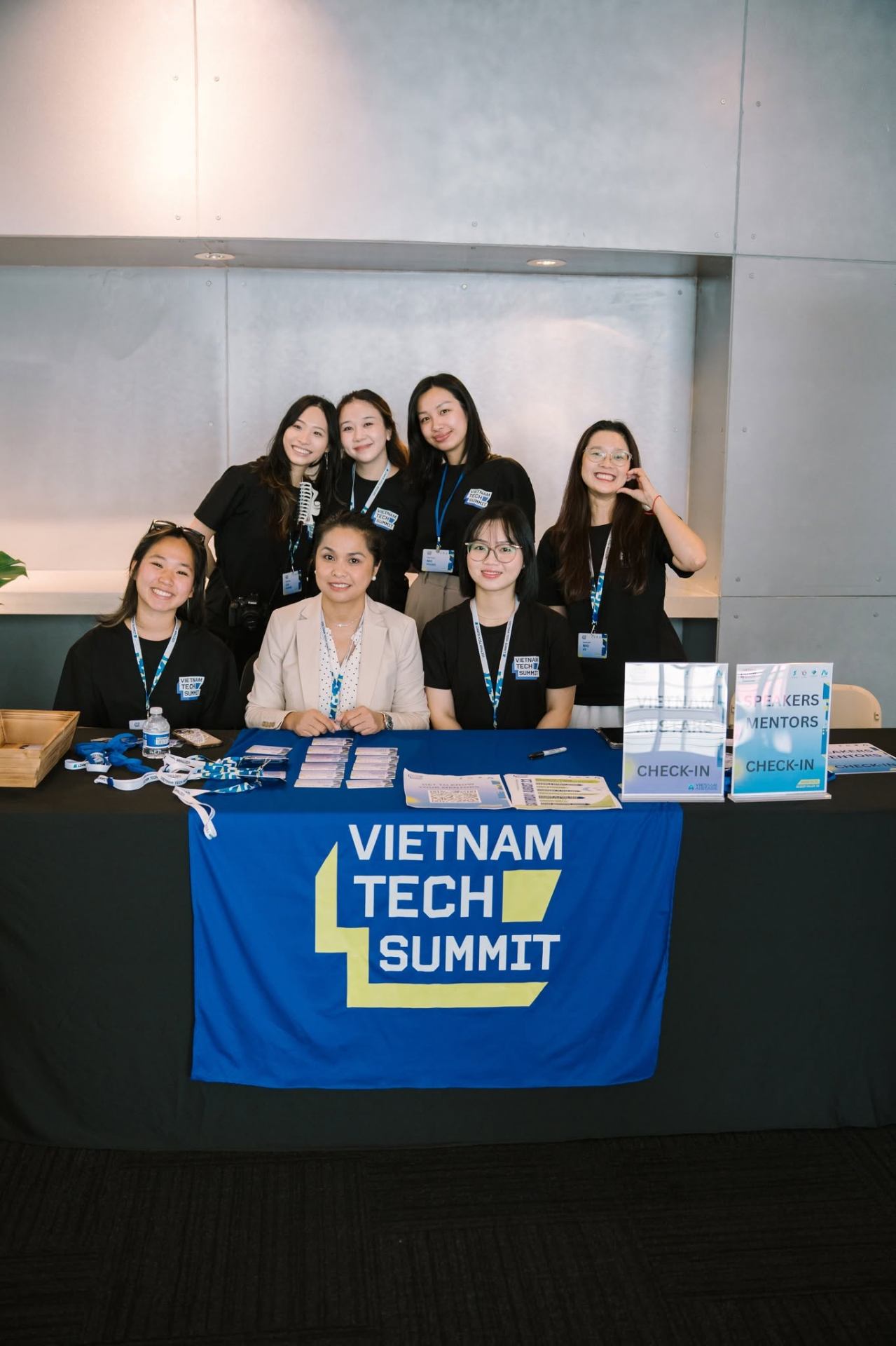 The Vietnam Tech Summit check-in desk with the organizing team