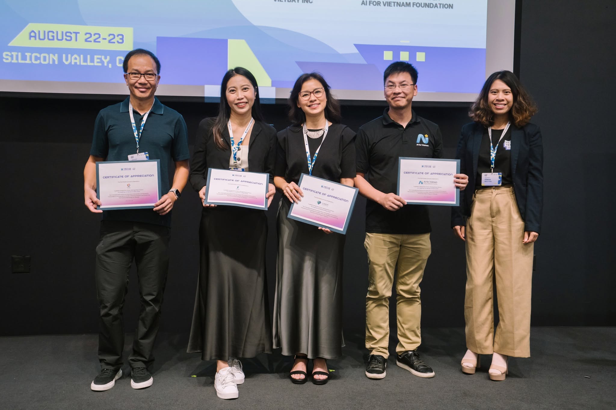 Five VietSpark partners holding Certificates of Appreciation on stage at Vietnam Tech Summit 2025 in Silicon Valley.