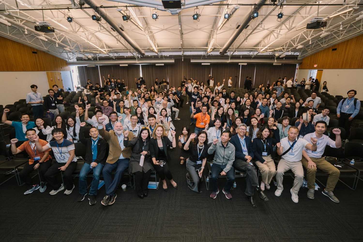 Attendees of Vietnam Tech Summit gather for a group photo inside the auditorium at the Computer History Museum in Silicon Valley.