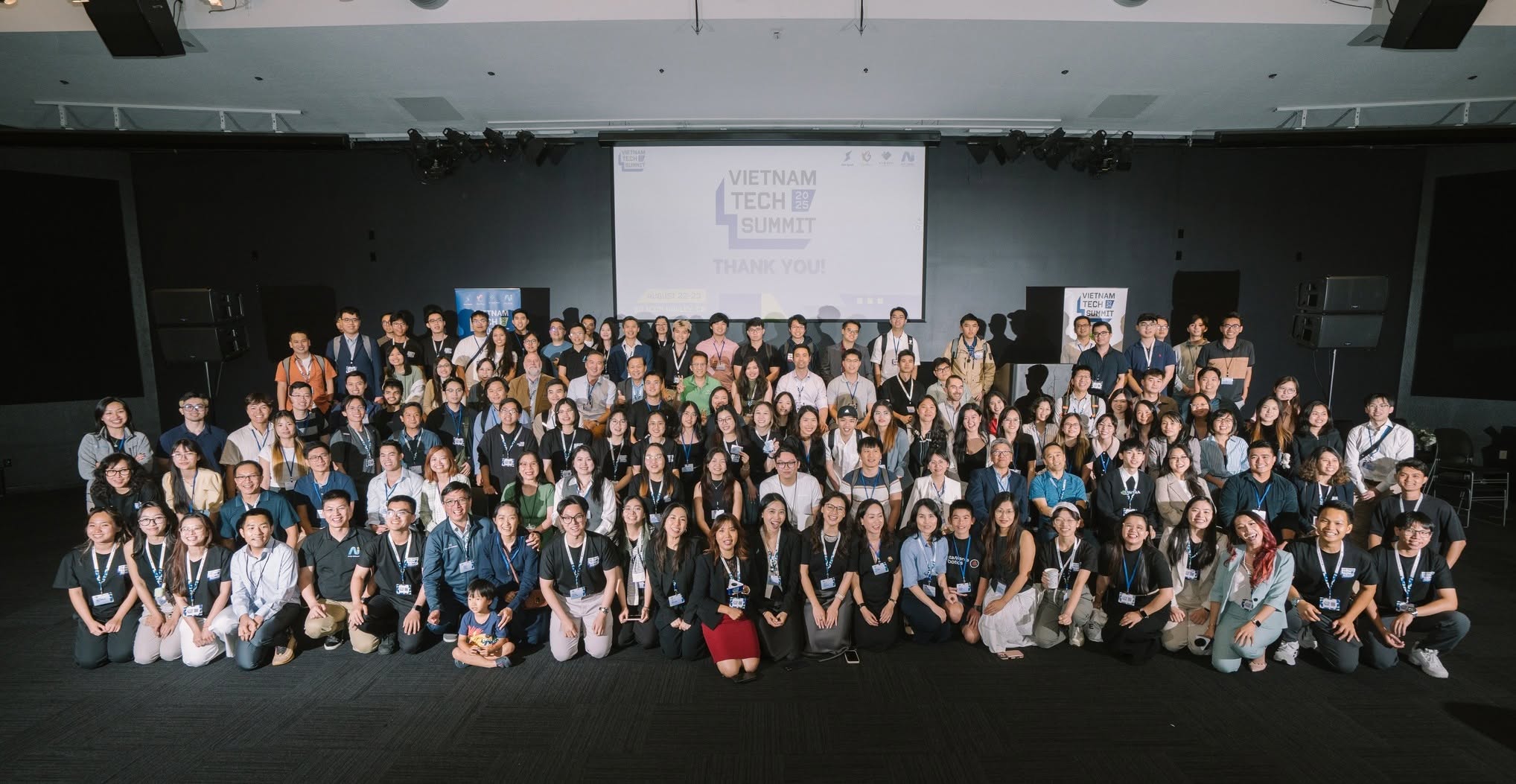 A large group of Vietnam Tech Summit 2025 attendees posing together in front of a “Thank You” closing slide.